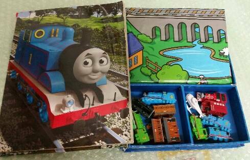 green toys train and storybook